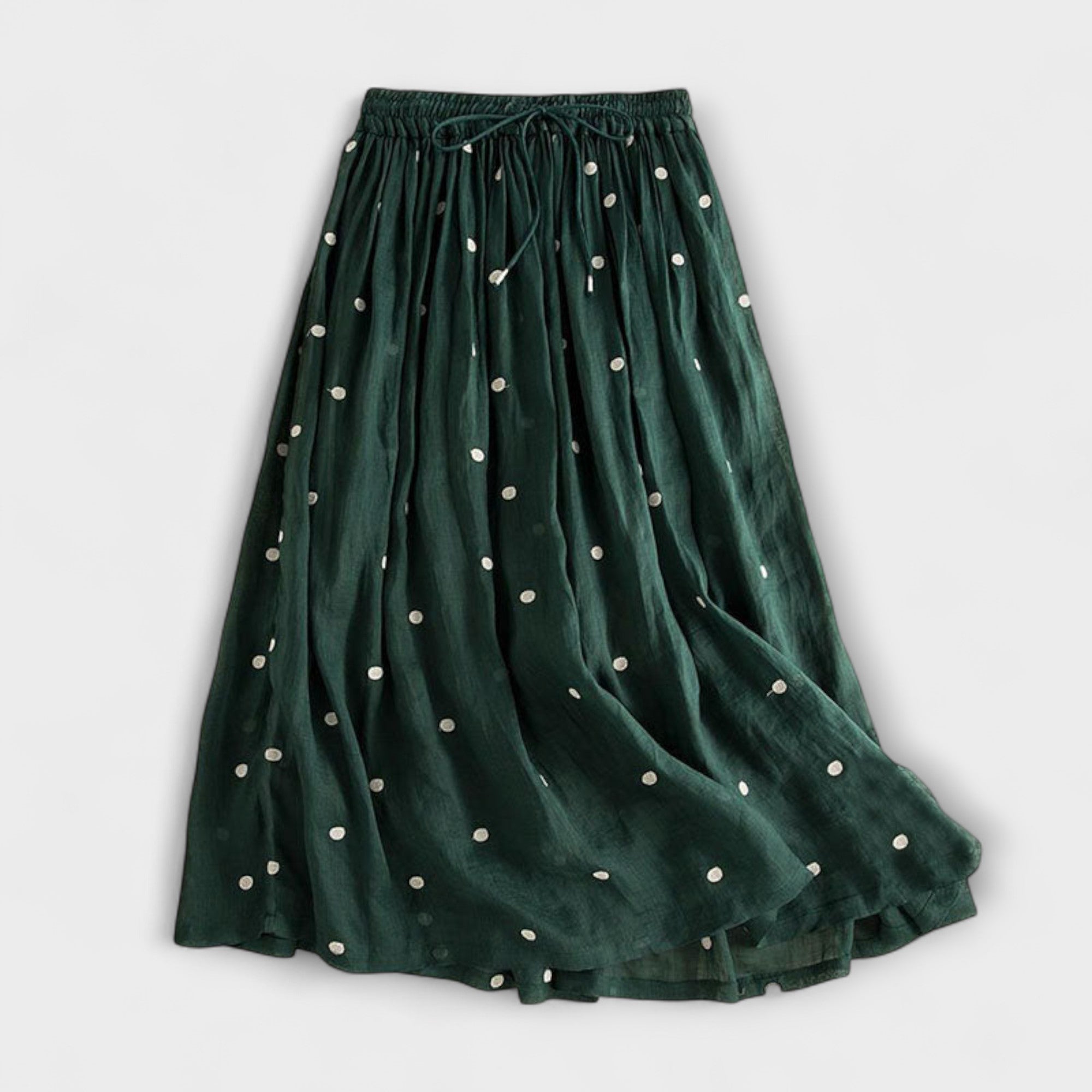 Playful polka-dot skirt made of cotton-linen.