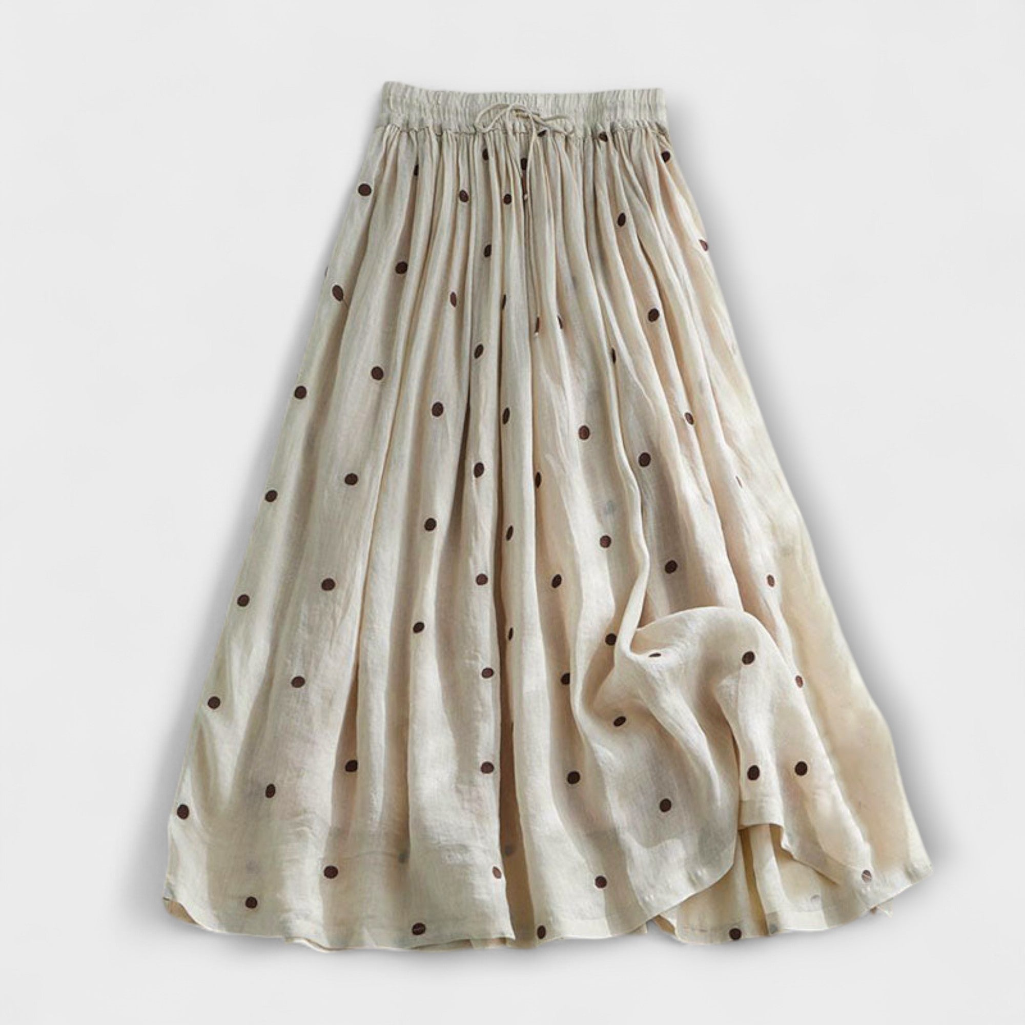 Playful polka-dot skirt made of cotton-linen.