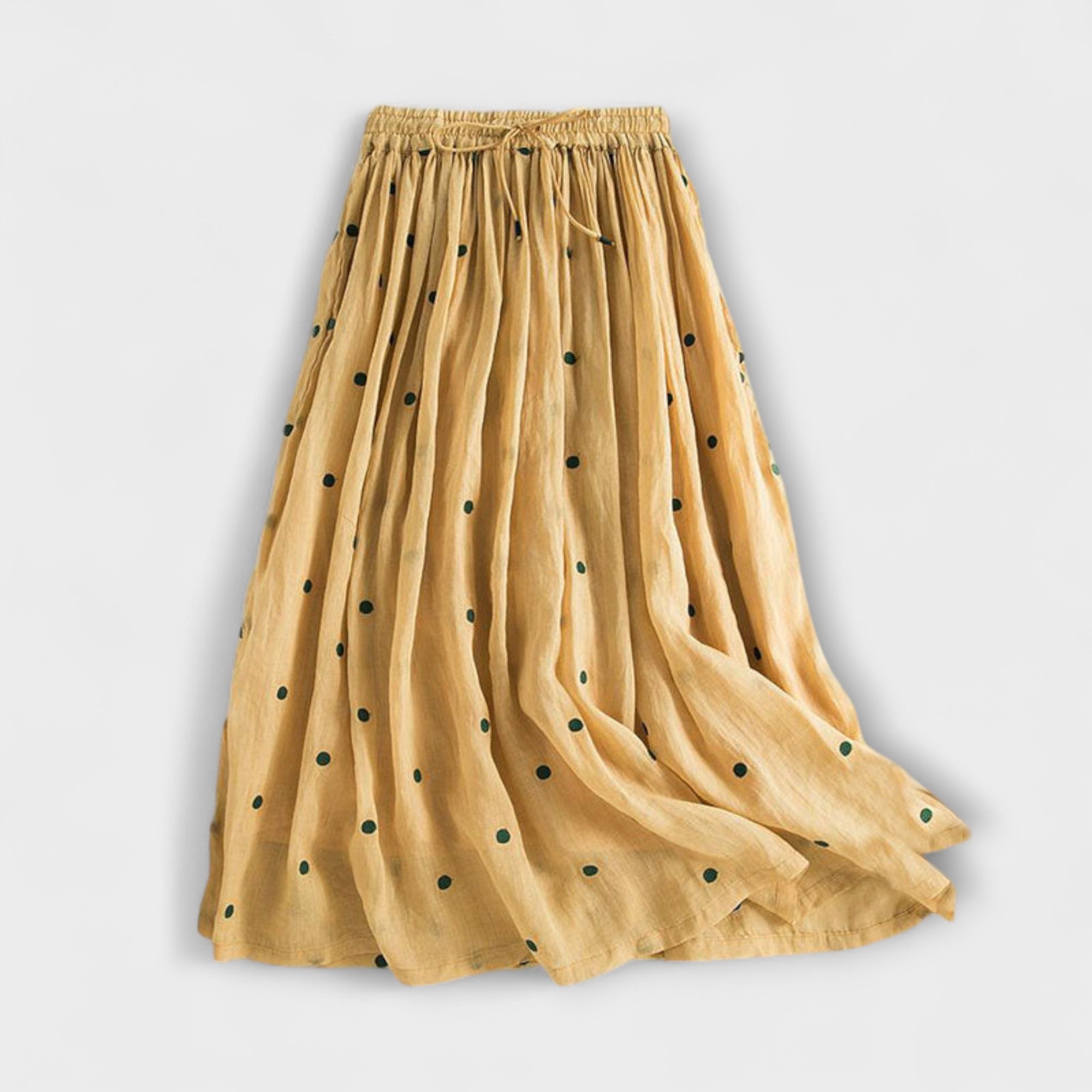 Playful polka-dot skirt made of cotton-linen.