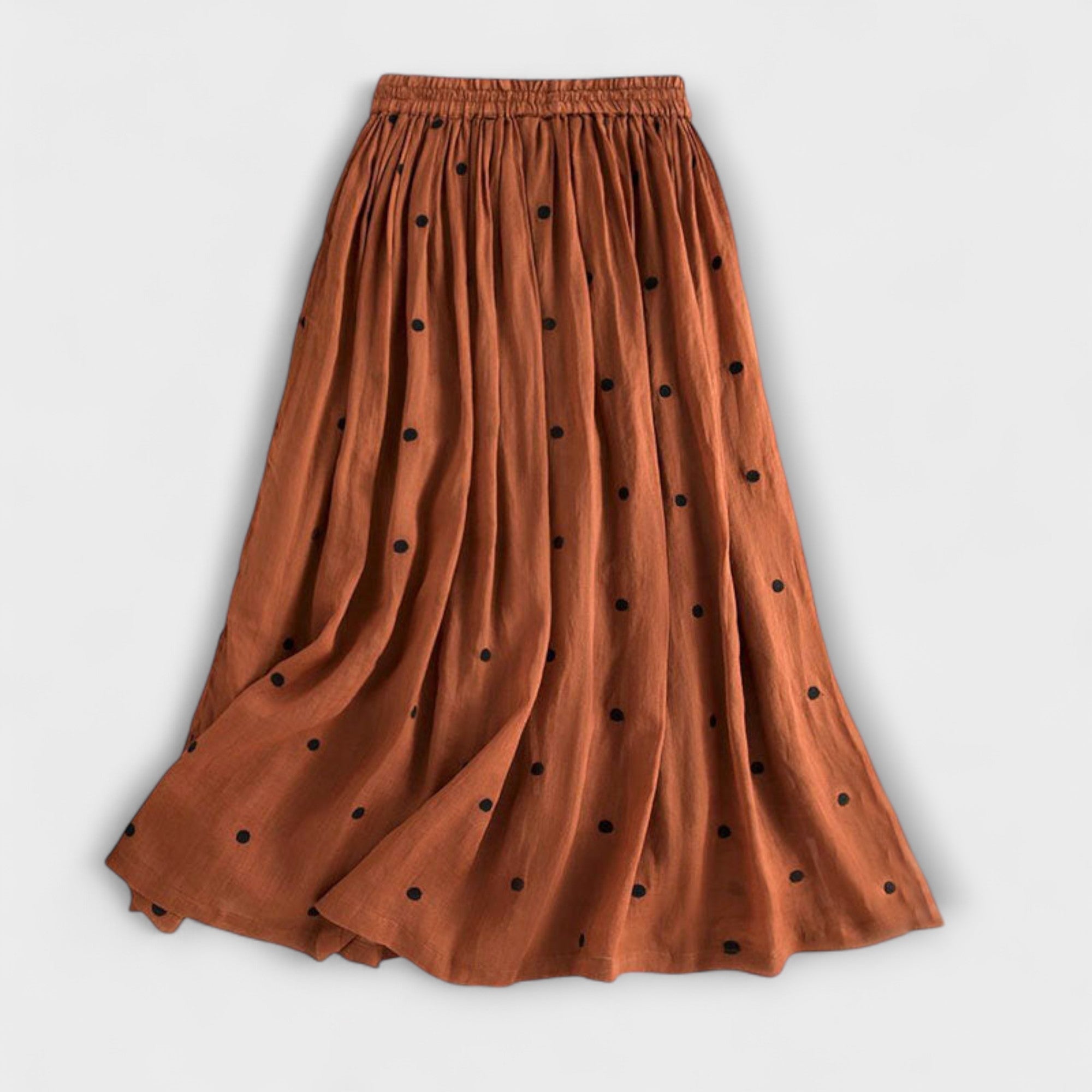 Playful polka-dot skirt made of cotton-linen.